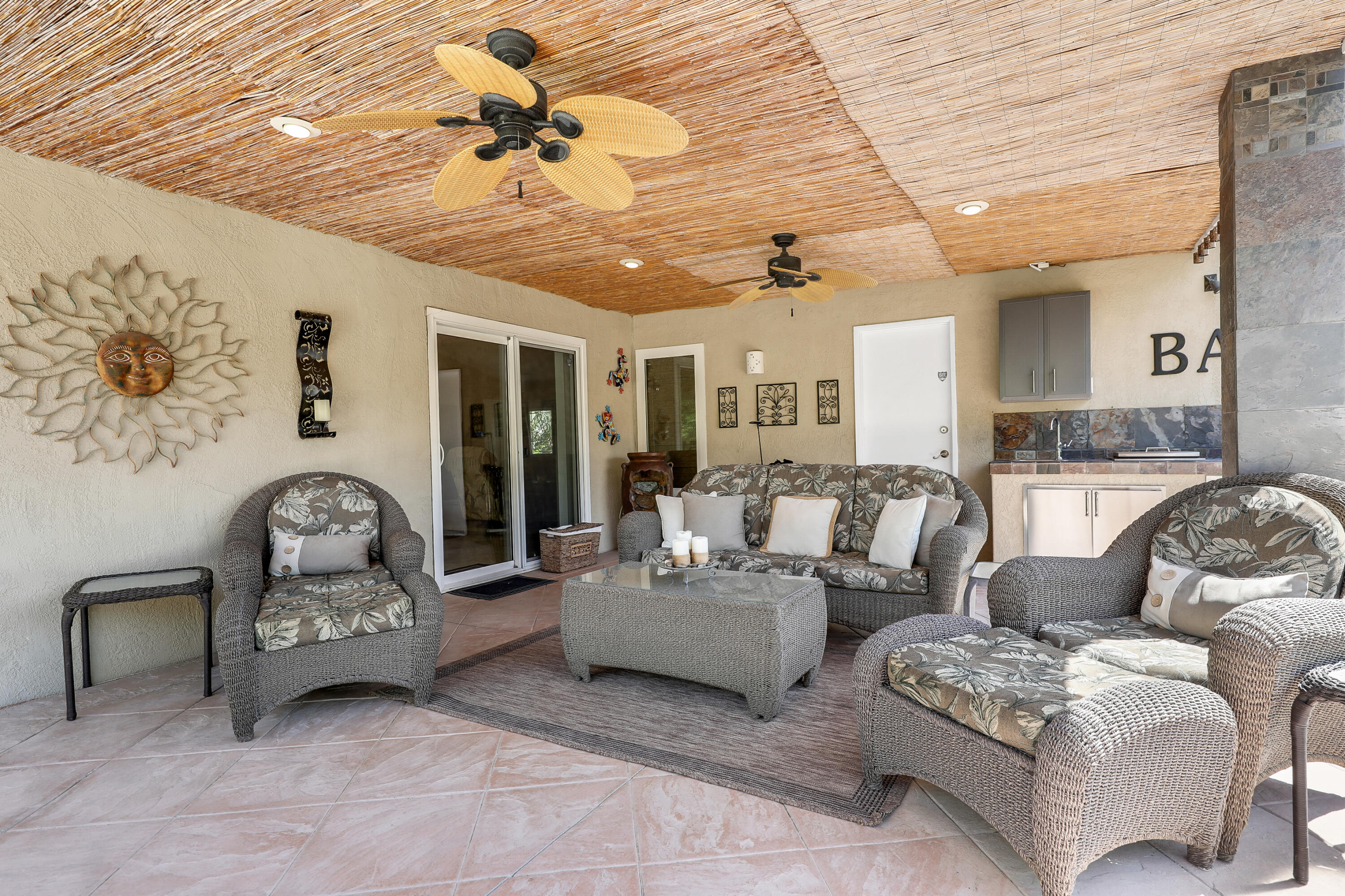 71601 Halgar Road Rancho Mirage, CA 92270 - Photo 13 of 35 a living room with furniture a chandelier
