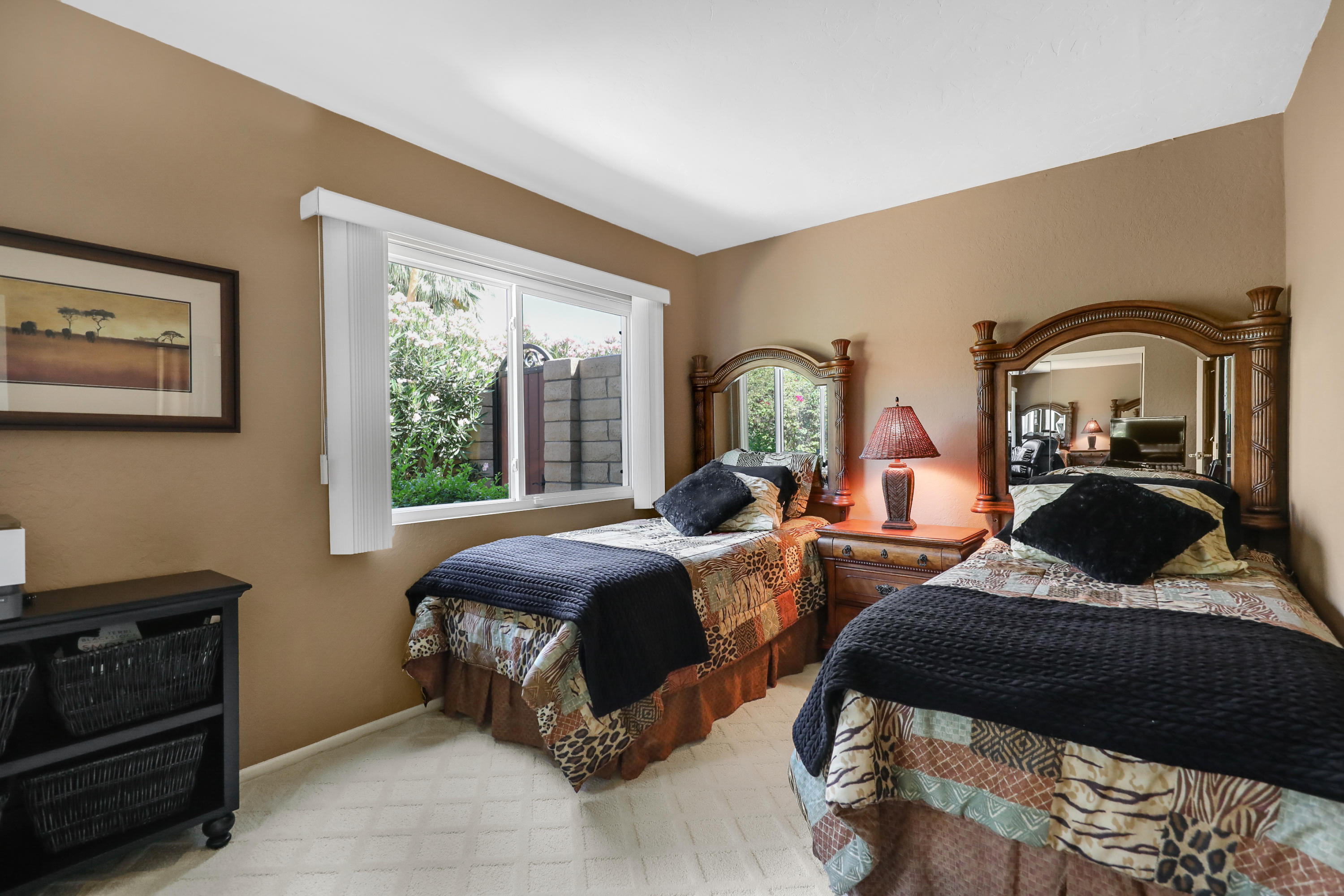 71601 Halgar Road Rancho Mirage, CA 92270 - Photo 22 of 35 a bedroom with two beds and a large window