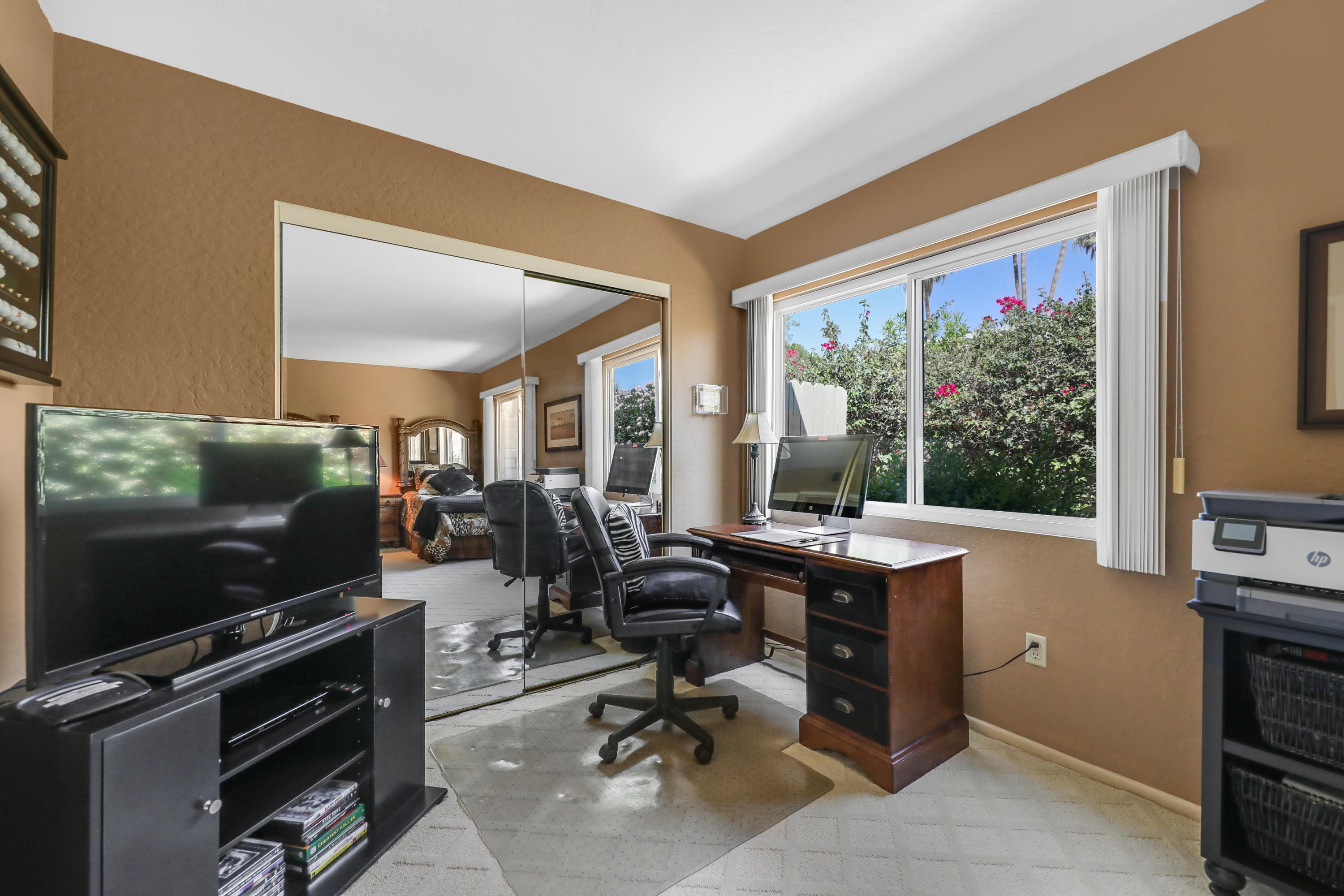 71601 Halgar Road Rancho Mirage, CA 92270 - Photo 23 of 35 a view of a livingroom with furniture workspace and a window