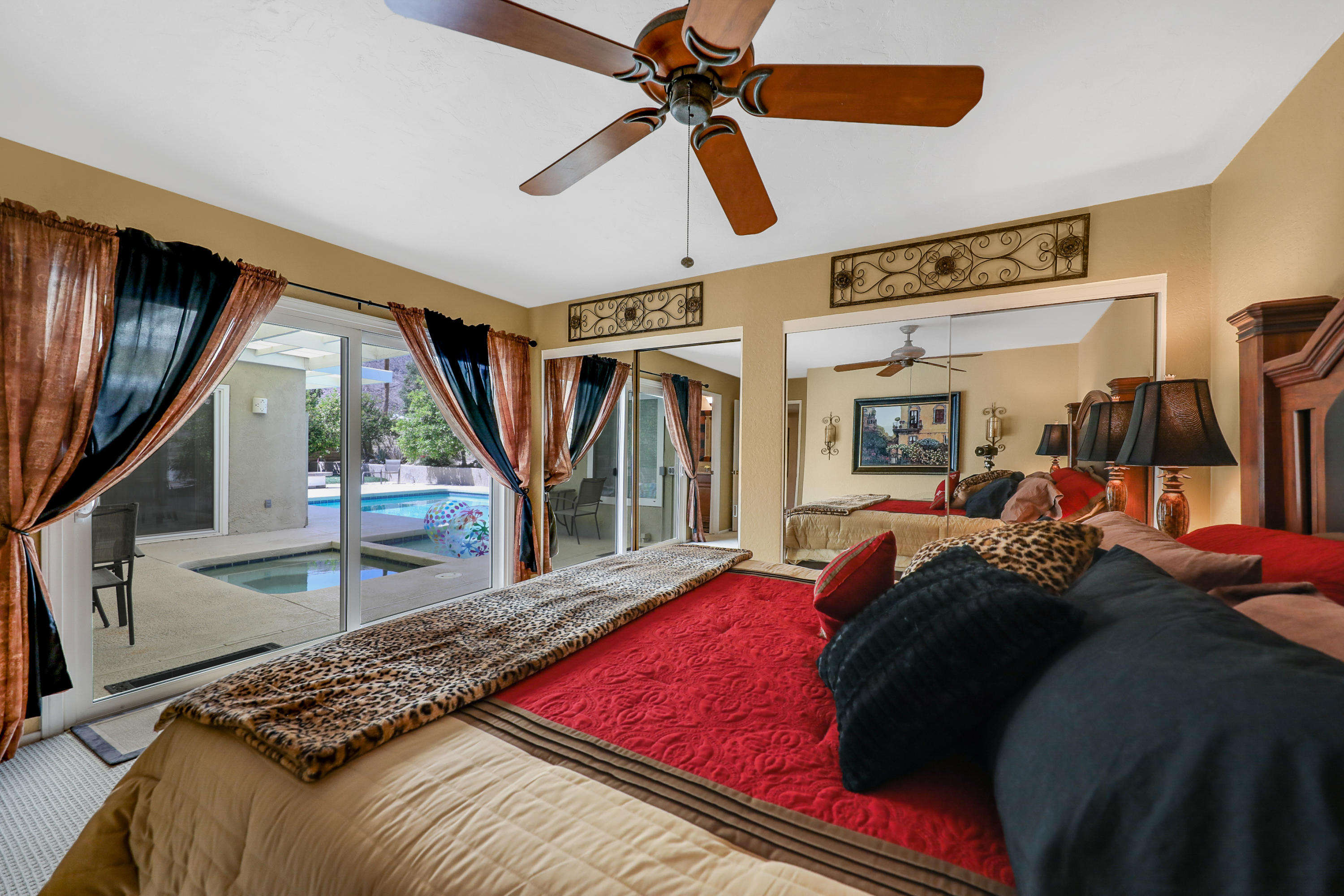 71601 Halgar Road Rancho Mirage, CA 92270 - Photo 25 of 35 a bed sitting in a bedroom next to a window
