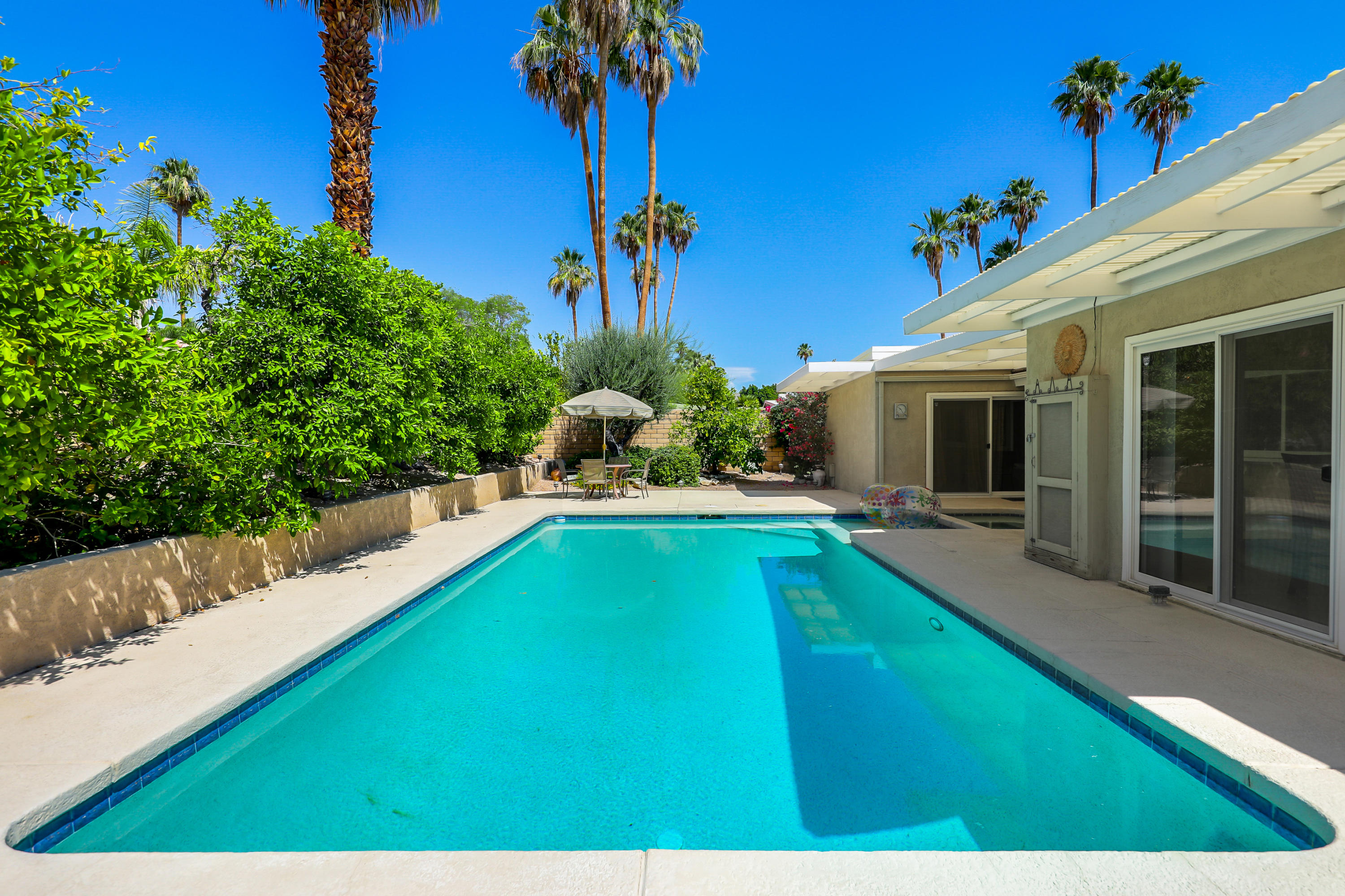 71601 Halgar Road Rancho Mirage, CA 92270 - Photo 32 of 35 a swimming pool with yard
