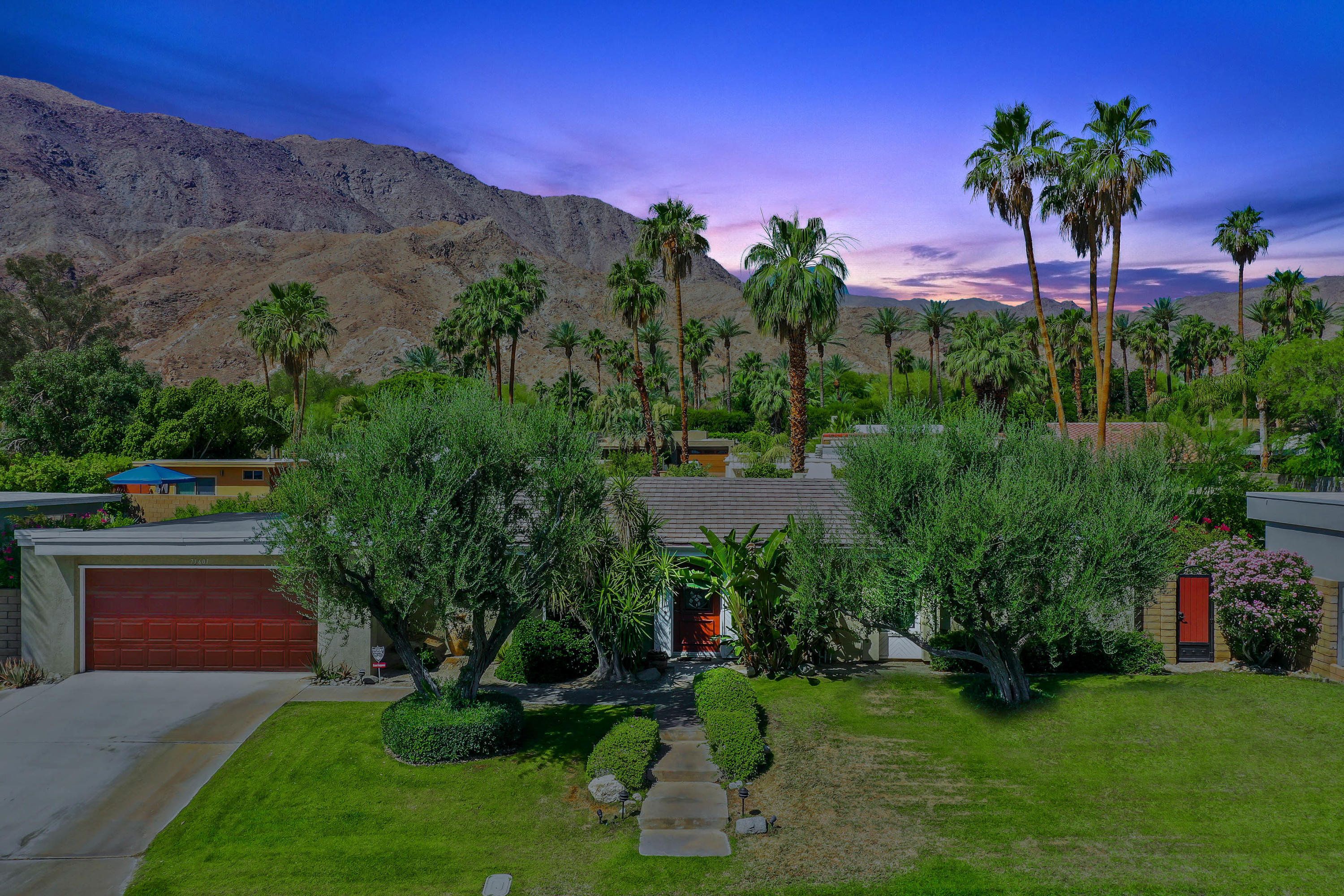 71601 Halgar Road Rancho Mirage, CA 92270 - Photo 34 of 35 a view of a garden with a house