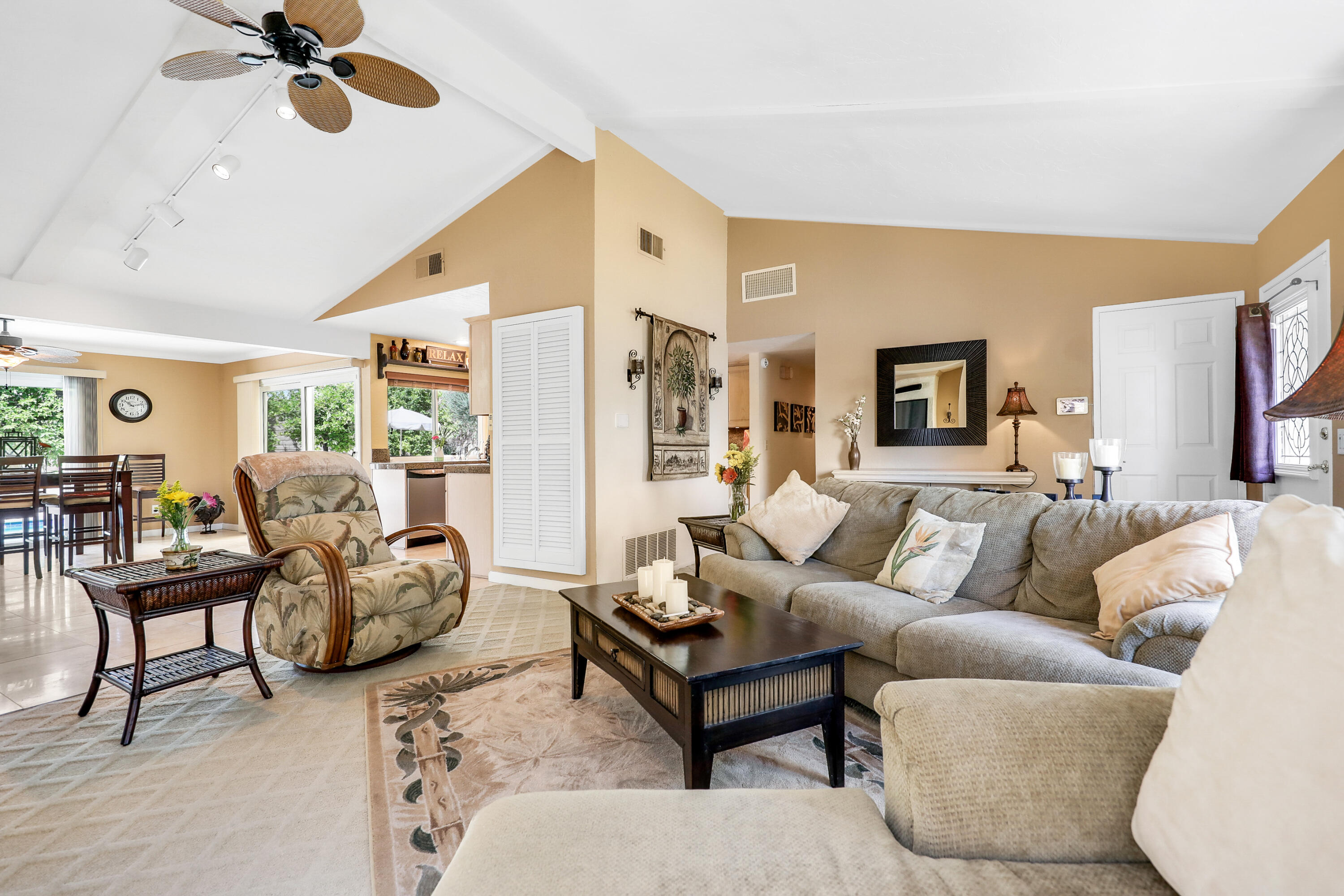 71601 Halgar Road Rancho Mirage, CA 92270 - Photo 10 of 35 a living room with furniture and a large window