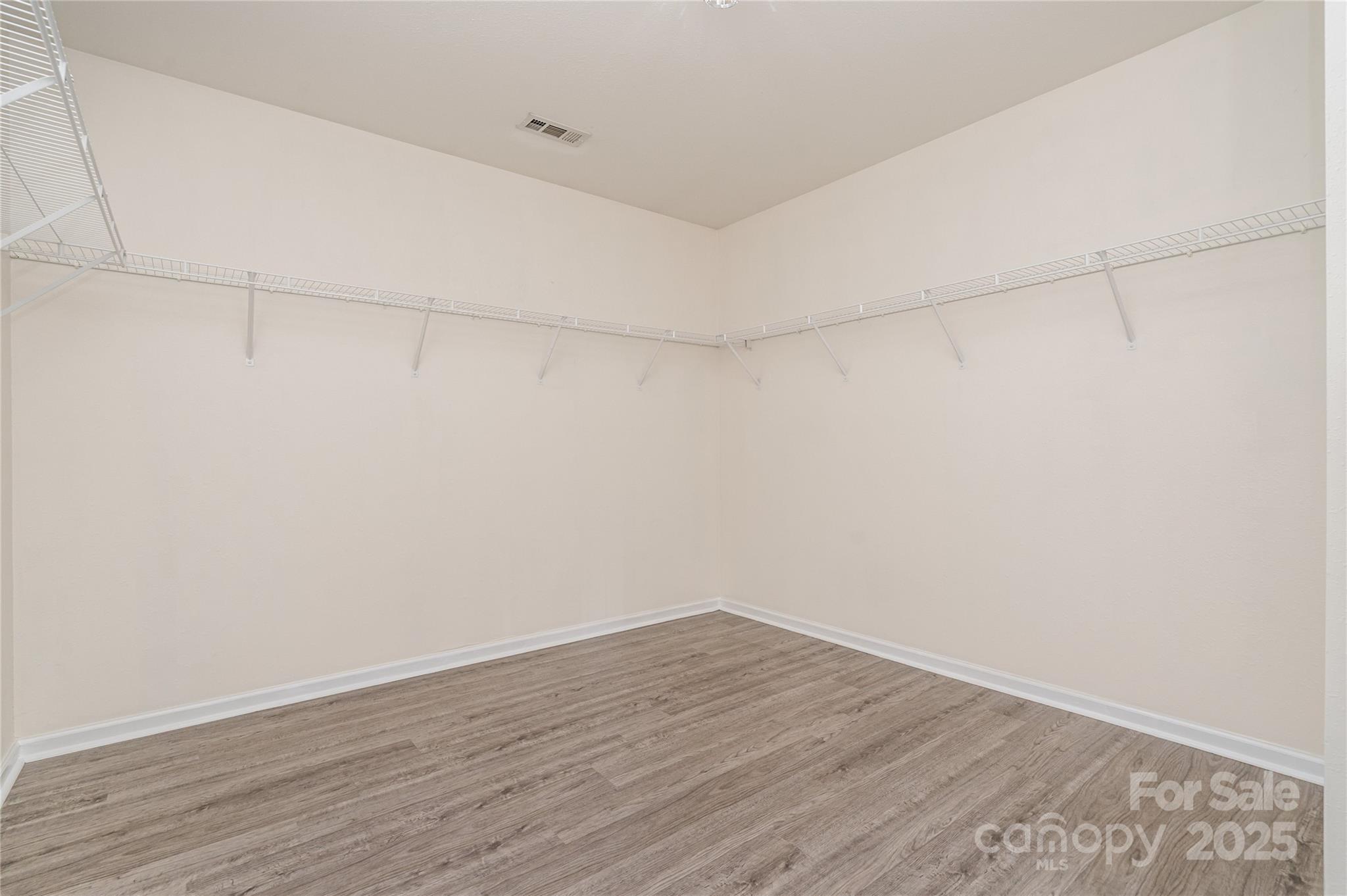 2919 Heather Ridge Road Dallas, NC 28034 - Photo 13 of 24 a view of a room with wooden floor