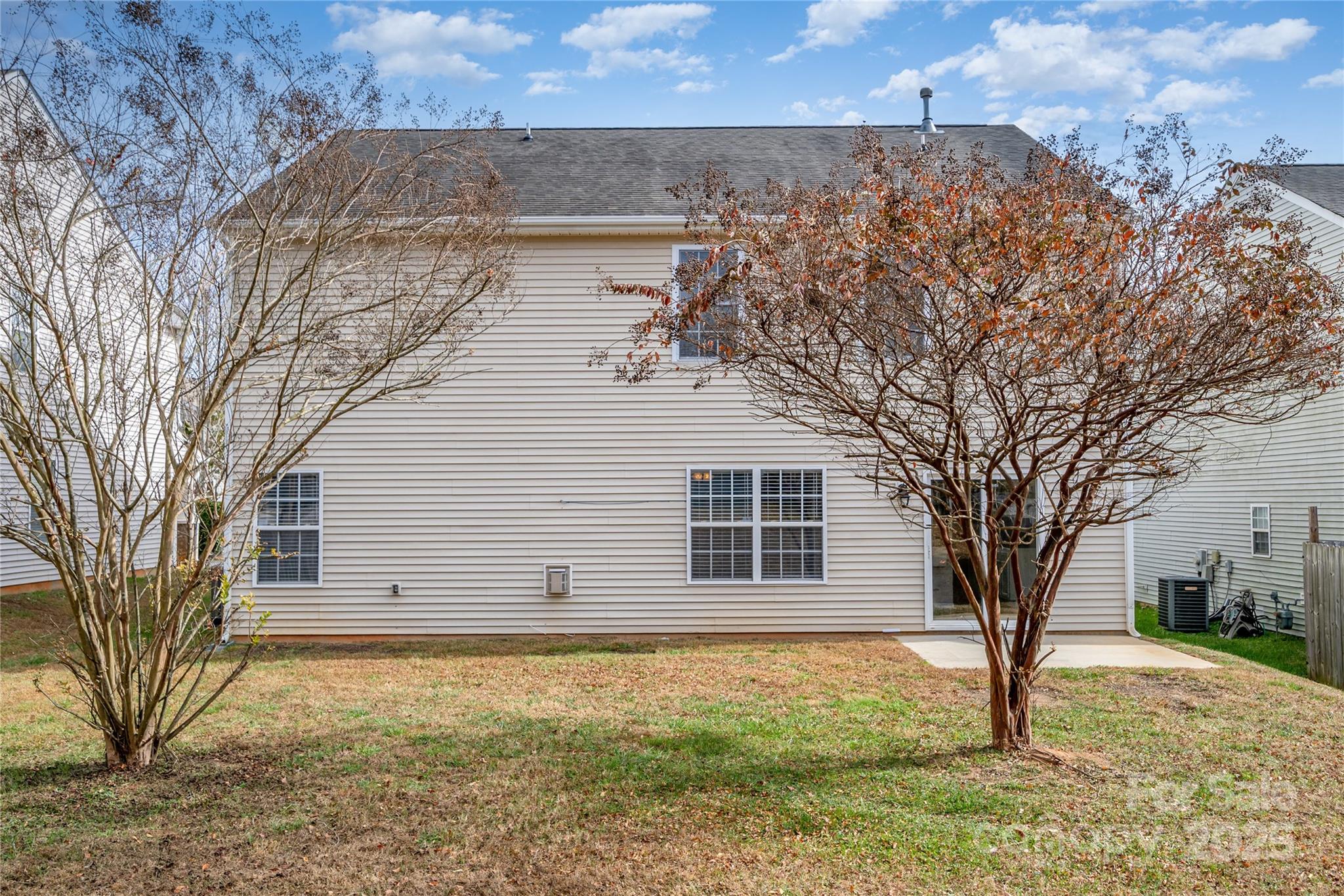 2919 Heather Ridge Road Dallas, NC 28034 - Photo 19 of 24 a house with trees in front of it