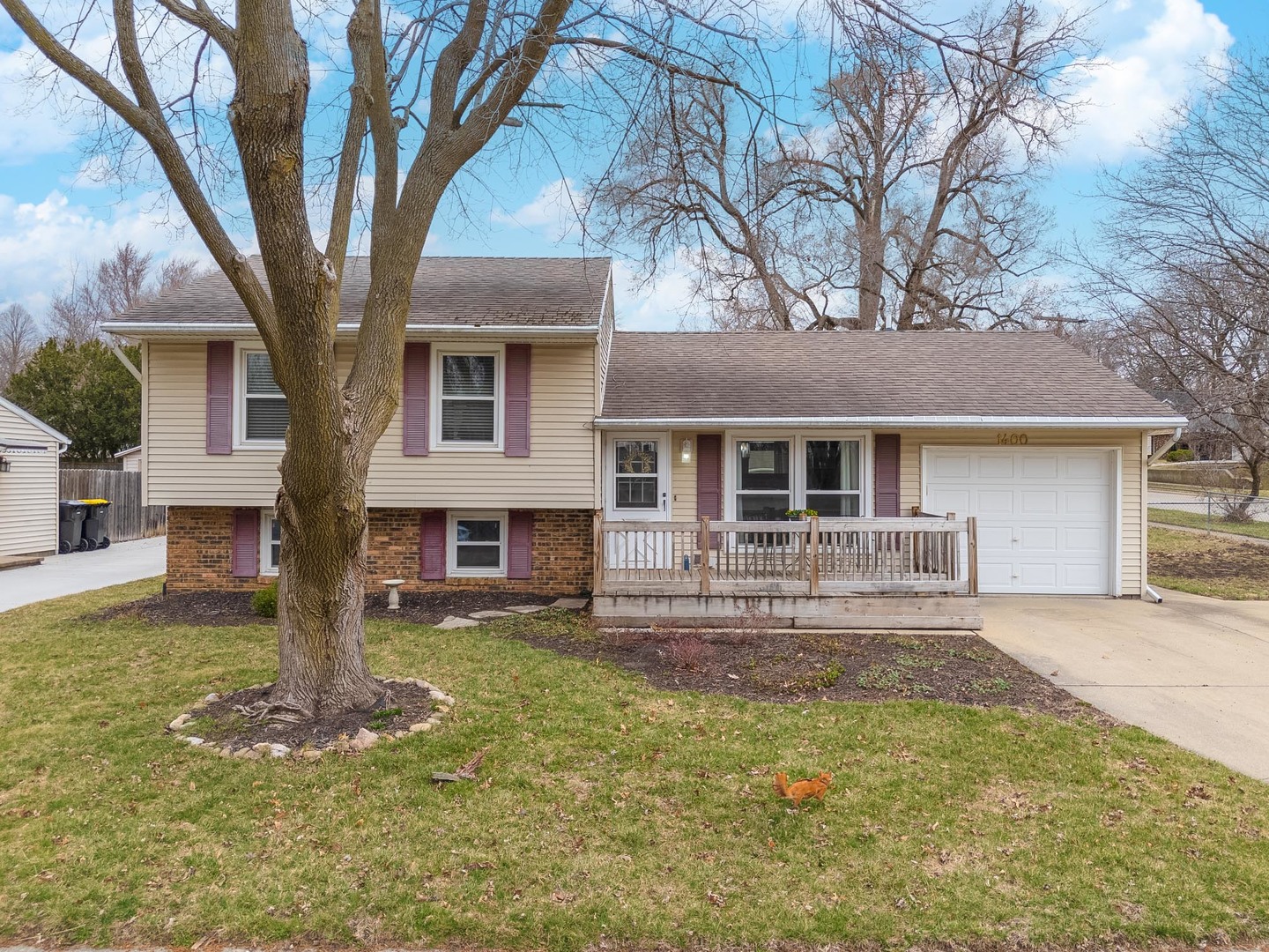 a front view of a house with yard