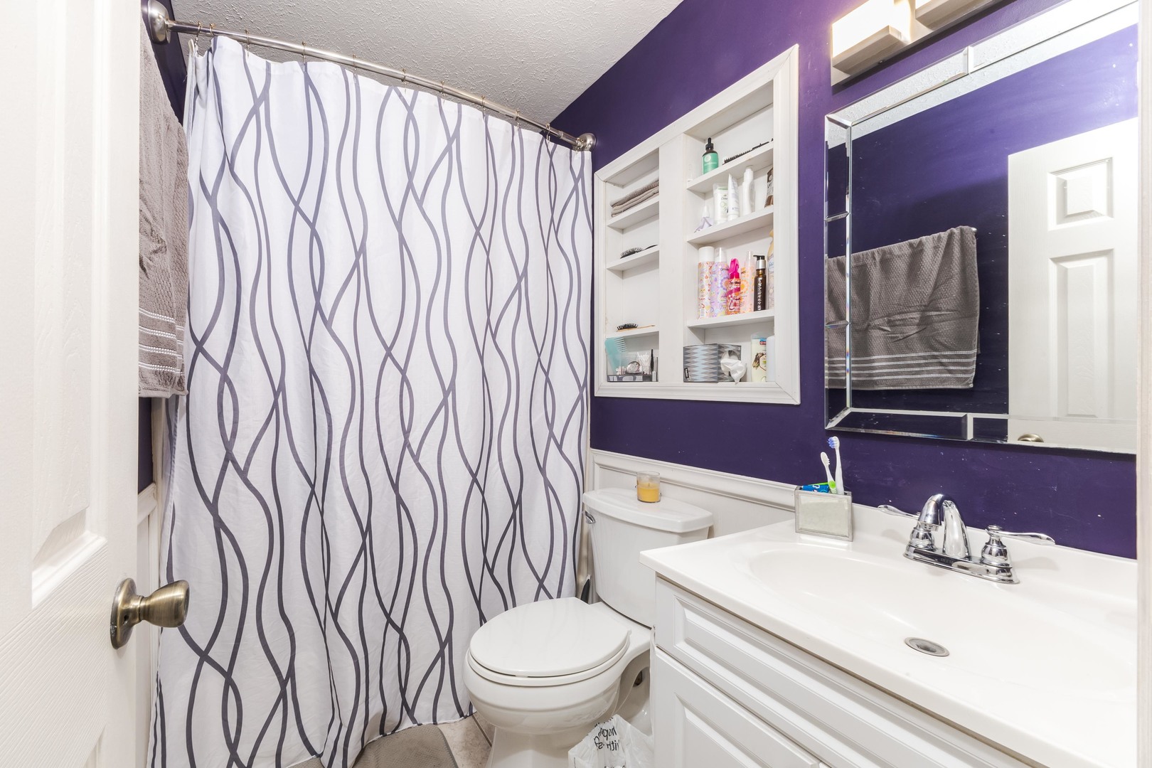 1400 Kingsridge Drive Normal, IL 61761 - Photo 17 of 31 a bathroom with a sink toilet and shower