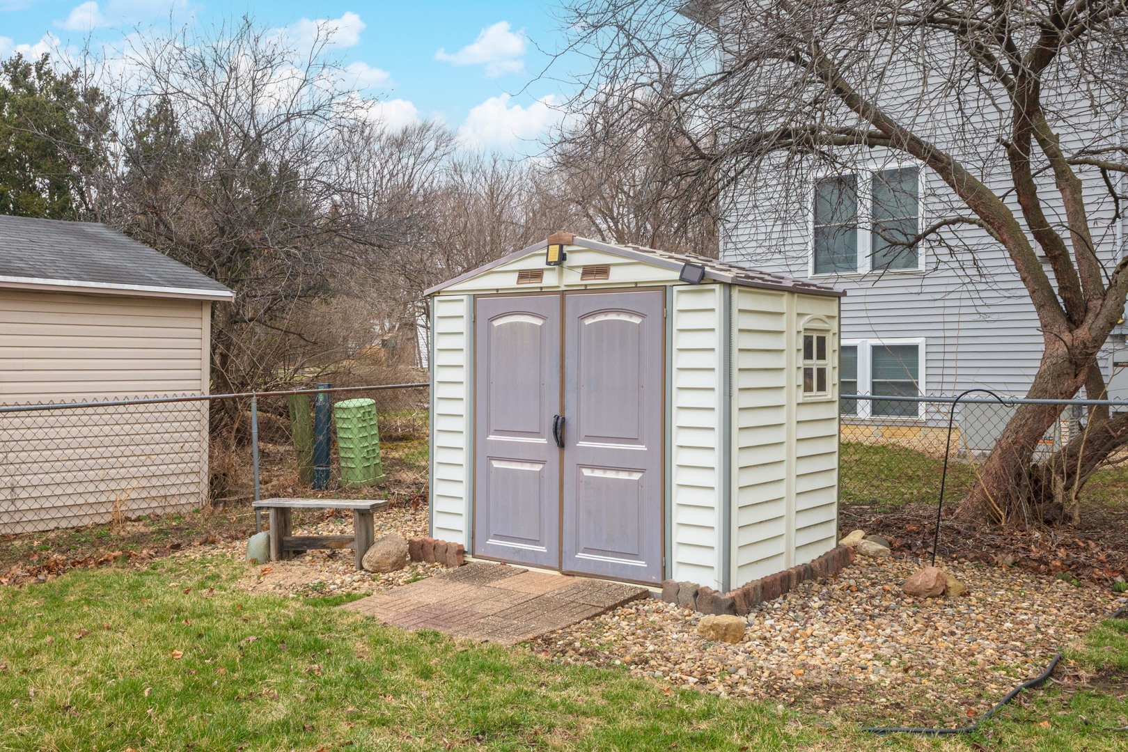 1400 Kingsridge Drive Normal, IL 61761 - Photo 25 of 31 a front view of a house with garden
