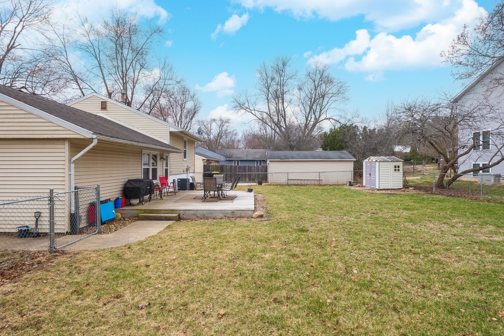 1400 Kingsridge Drive Normal, IL 61761 - Photo 28 of 31 a view of a house with backyard and sitting area