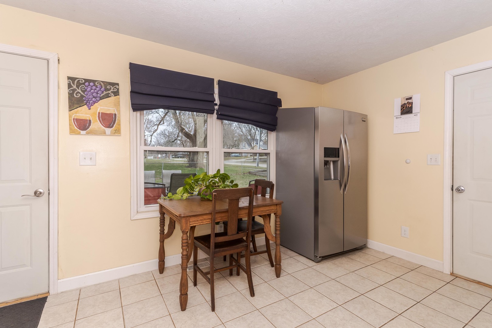 1400 Kingsridge Drive Normal, IL 61761 - Photo 8 of 31 a view of a dining room with furniture window and outside view