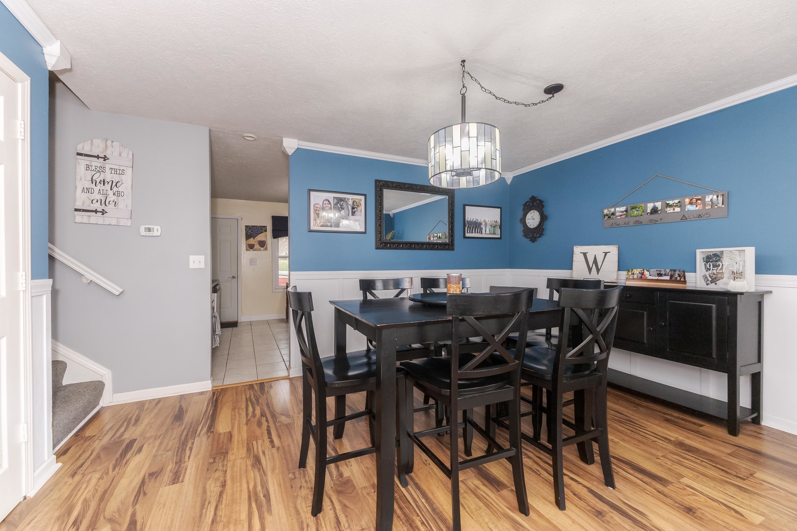 1400 Kingsridge Drive Normal, IL 61761 - Photo 10 of 31 a view of a dining room with furniture and wooden floor