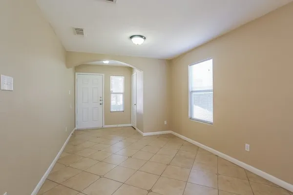 a view of an empty room with window