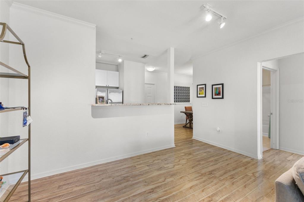 4221 West Spruce Street, Unit 1326 Tampa, FL 33607 - Photo 11 of 45 a view of a kitchen with a sink and a refrigerator