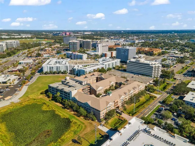 an aerial view of a city with an ocean view
