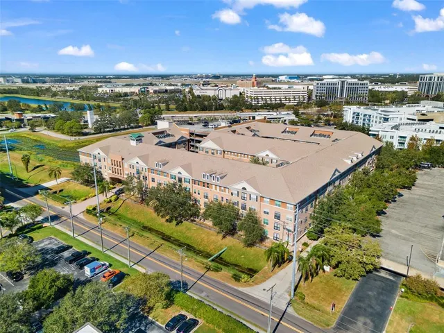 a view of swimming pool with outdoor seating