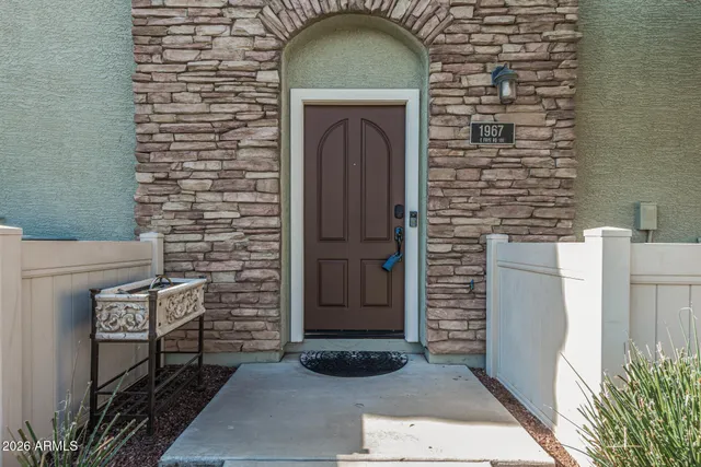 a front view of a house with parking space