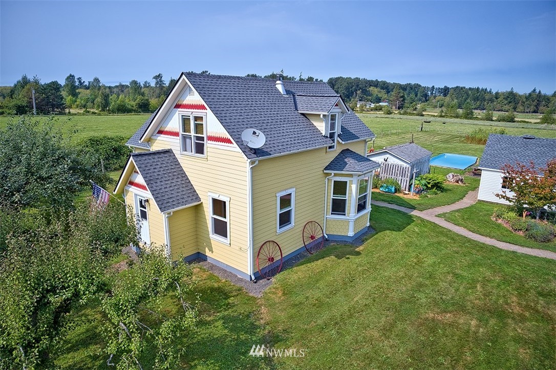 3668 Bay Road Ferndale, WA 98248 - Photo 1 of 40 an aerial view of a house with outdoor space and street view