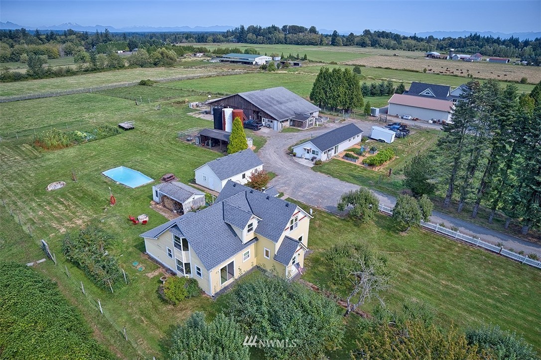 3668 Bay Road Ferndale, WA 98248 - Photo 2 of 40 an aerial view of a house with garden space and outdoor space
