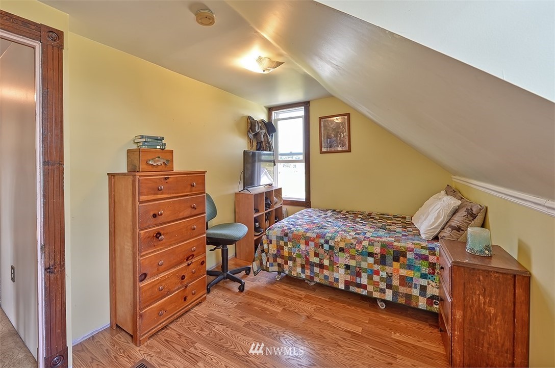 3668 Bay Road Ferndale, WA 98248 - Photo 11 of 40 a bedroom with a bed and a tv