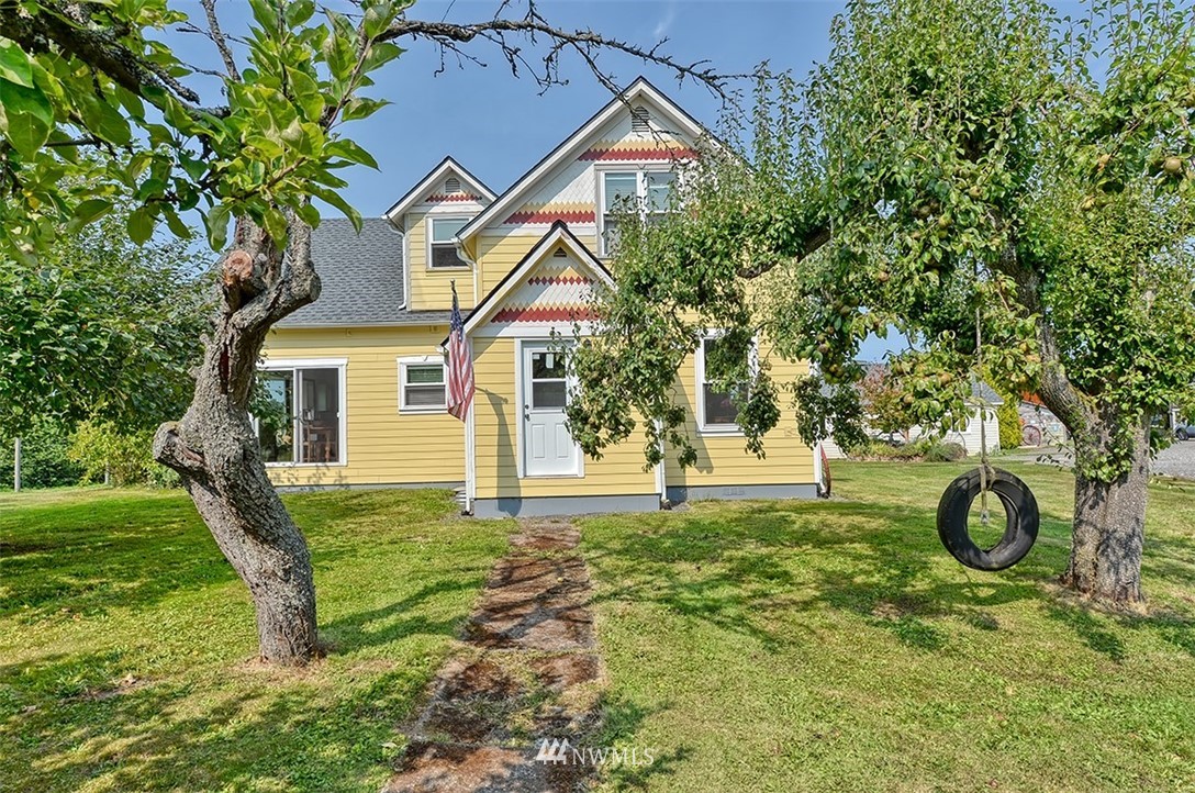 3668 Bay Road Ferndale, WA 98248 - Photo 24 of 40 a front view of a house with a yard
