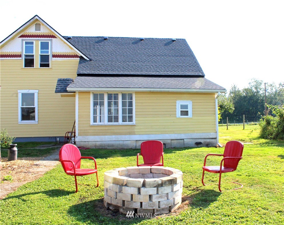 3668 Bay Road Ferndale, WA 98248 - Photo 38 of 40 a backyard of a house with outdoor seating