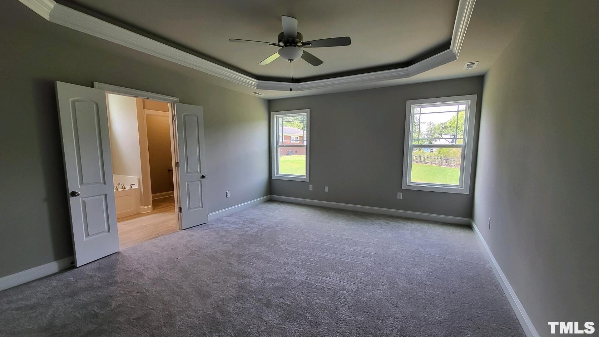33 Crystal Spgs Way Benson, NC 27504 - Photo 7 of 15 a view of an empty room with a window