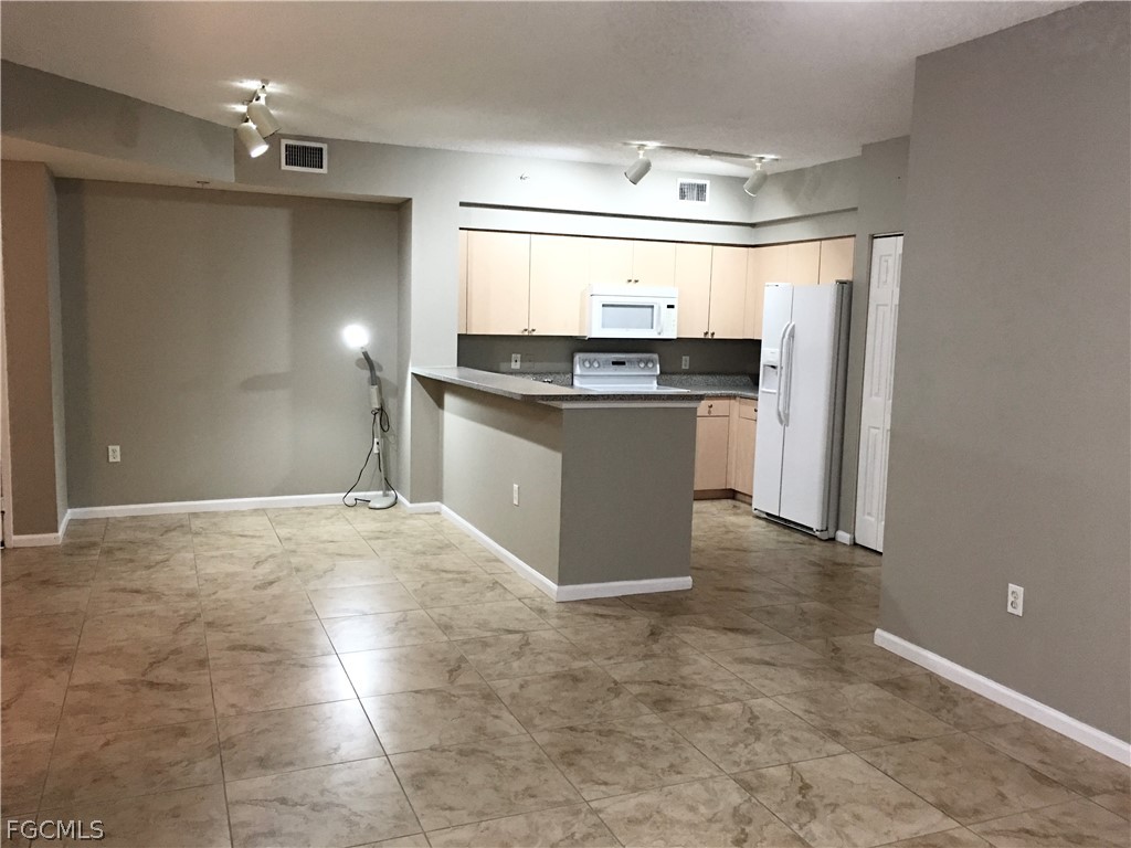 1230 Reserve Way, Unit 102 Naples, FL 34105 - Photo 2 of 7