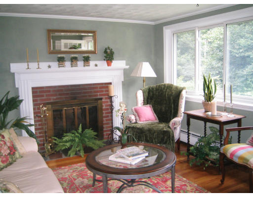 3 Linda Road Andover, MA 01810 - Photo 7 of 10 a living room with furniture and a fireplace