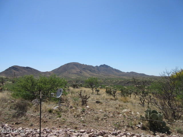 1881 Via Ochoa Rio Rico, AZ 85648 - Photo 19 of 44 a view of a mountain range with trees in the background
