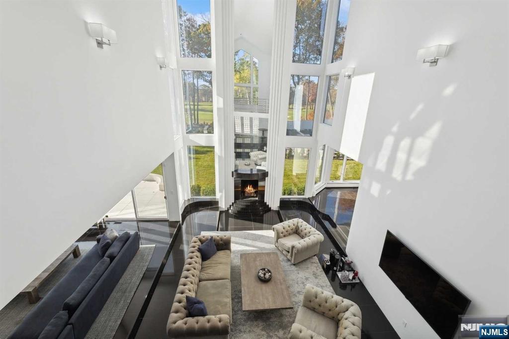 23 Rio Vista Drive Alpine, NJ 07620 - Photo 14 of 47 a view of living room with patio furniture