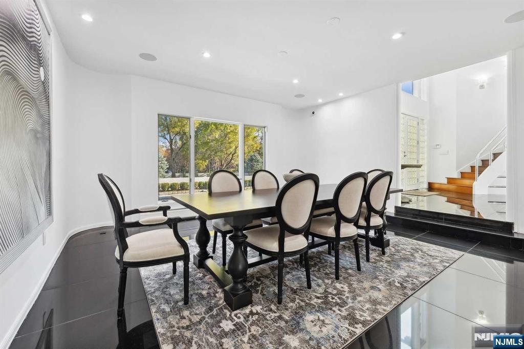 23 Rio Vista Drive Alpine, NJ 07620 - Photo 20 of 47 a view of a dining room with furniture and a rug