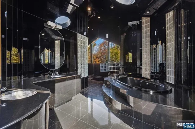 a large kitchen with lots of counter space and a sink
