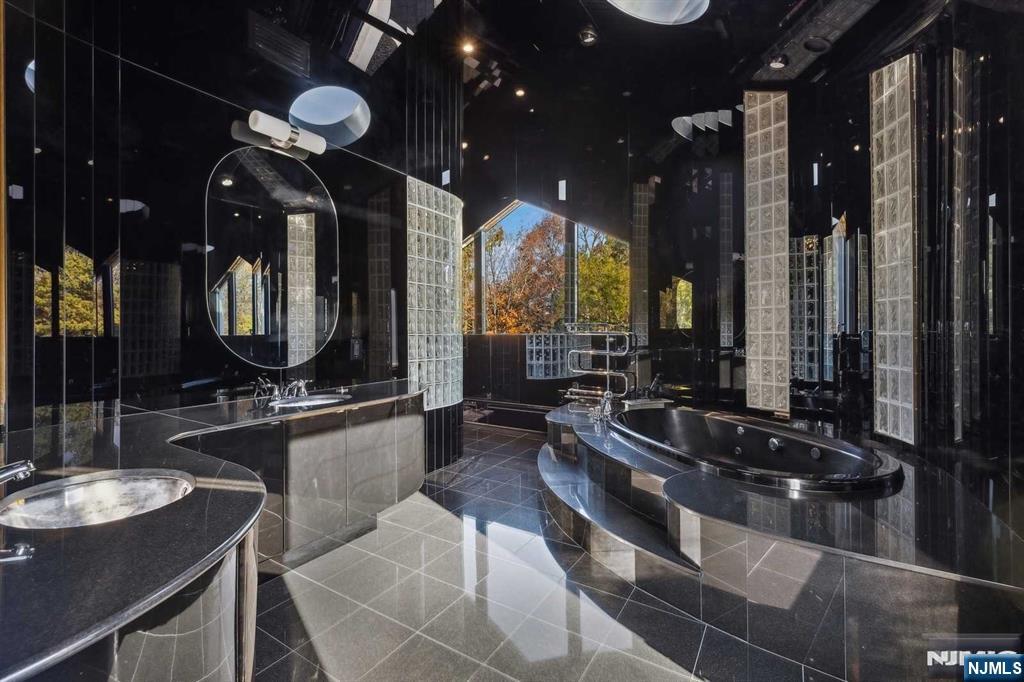 23 Rio Vista Drive Alpine, NJ 07620 - Photo 27 of 47 a large kitchen with lots of counter space and a sink