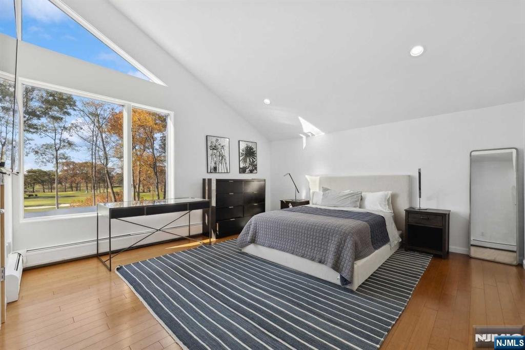 23 Rio Vista Drive Alpine, NJ 07620 - Photo 29 of 47 a bedroom with double bed and a large window