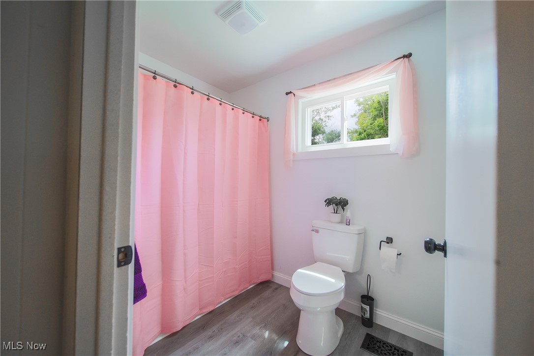 3181 Dover Road Wooster, OH 44691 - Photo 15 of 25 Bathroom featuring toilet and hardwood / wood-style flooring