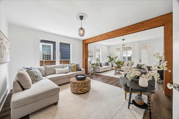 a view of a livingroom with furniture and window