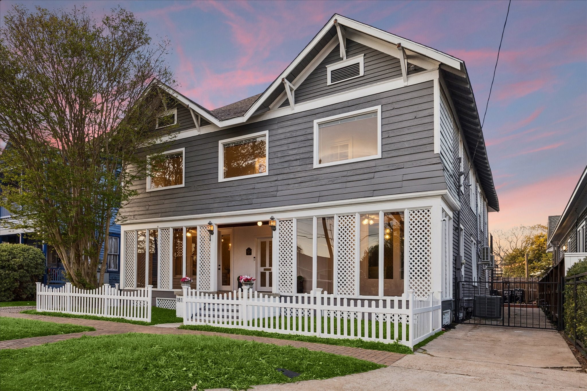 1812 Kane Street Houston, TX 77007 - Photo 2 of 41 a front view of a house with a yard
