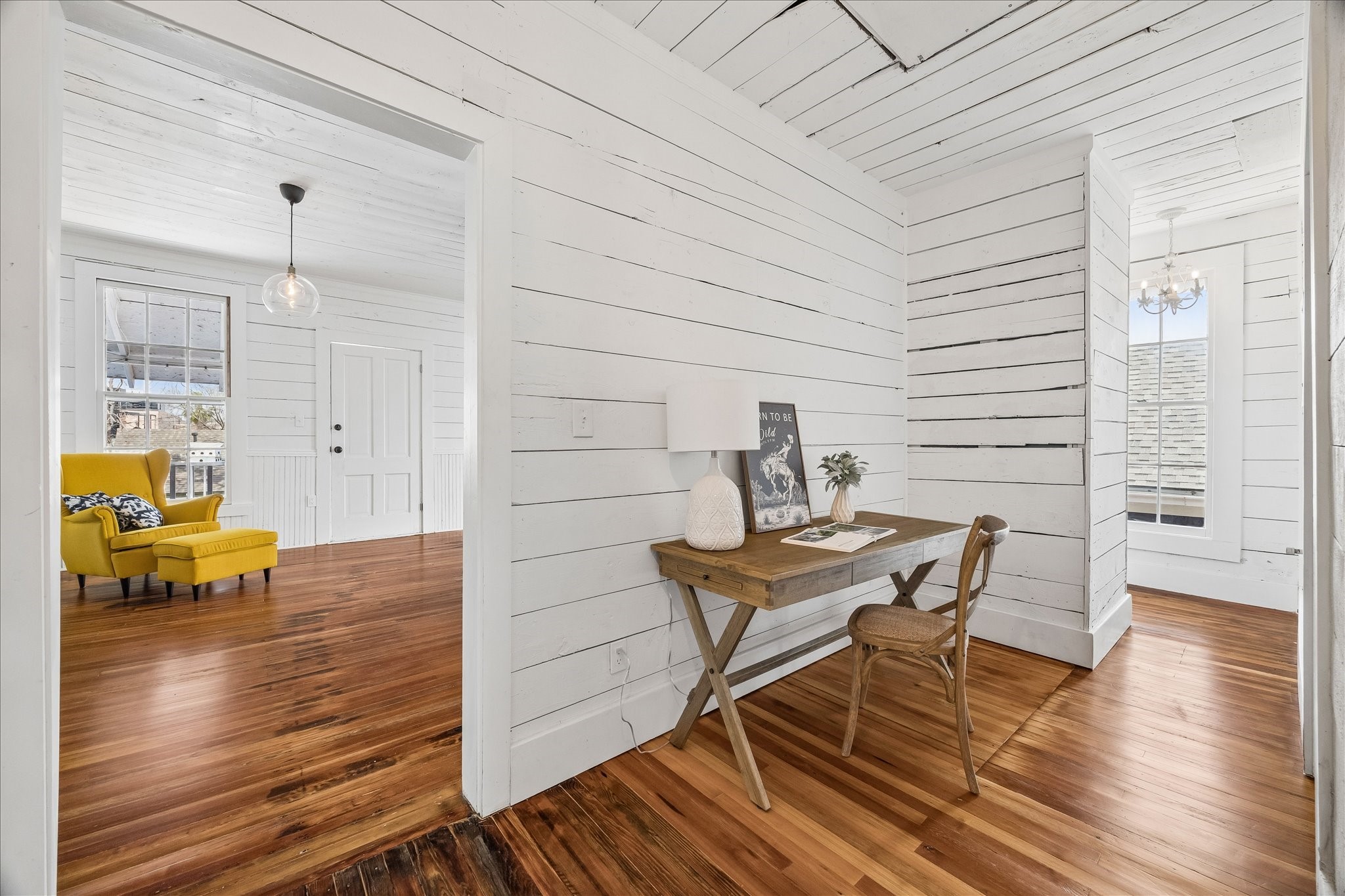 1812 Kane Street Houston, TX 77007 - Photo 30 of 41 a view of a dining room with furniture and wooden floor