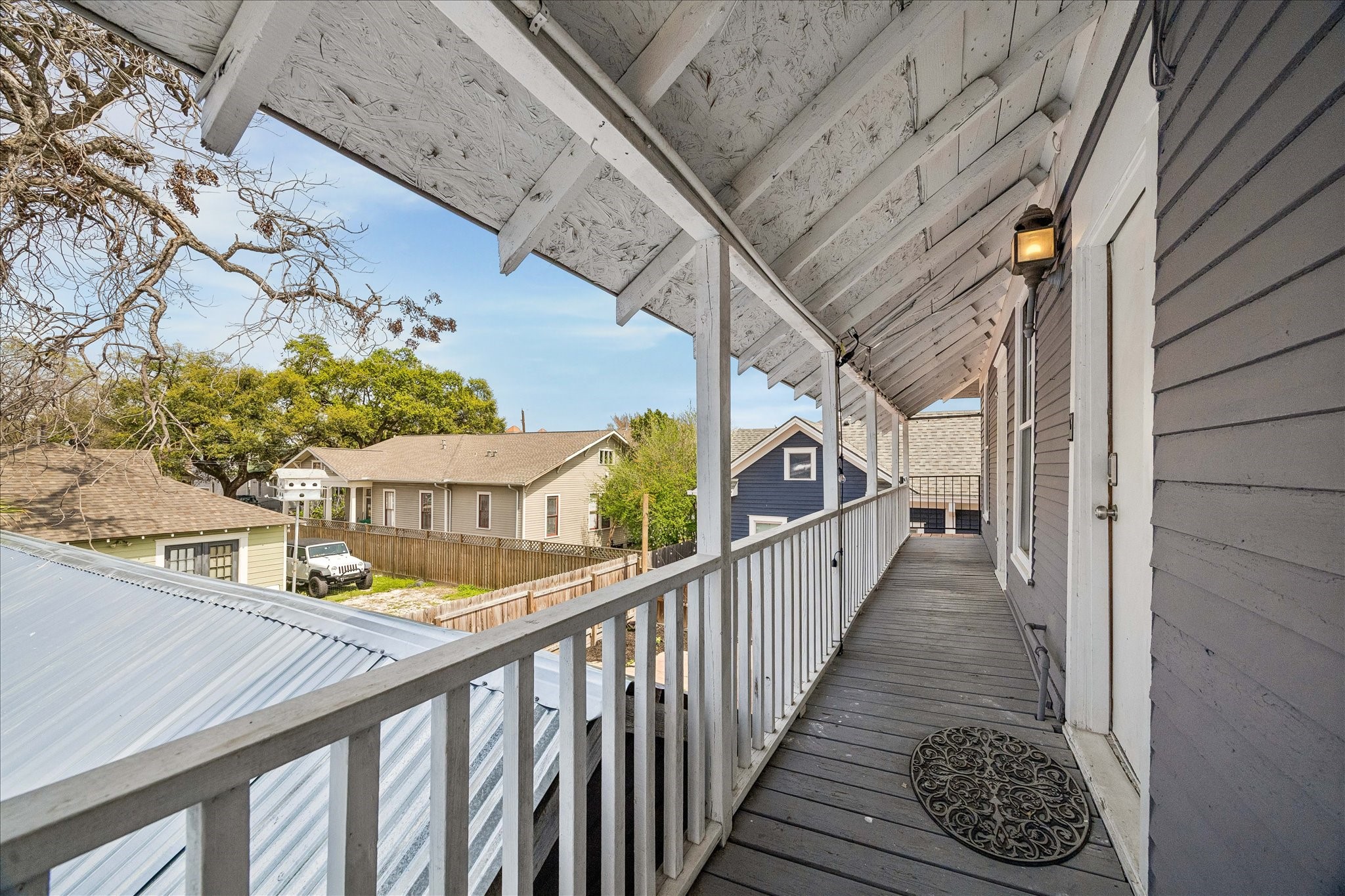 1812 Kane Street Houston, TX 77007 - Photo 32 of 41 a view of balcony with wooden floor
