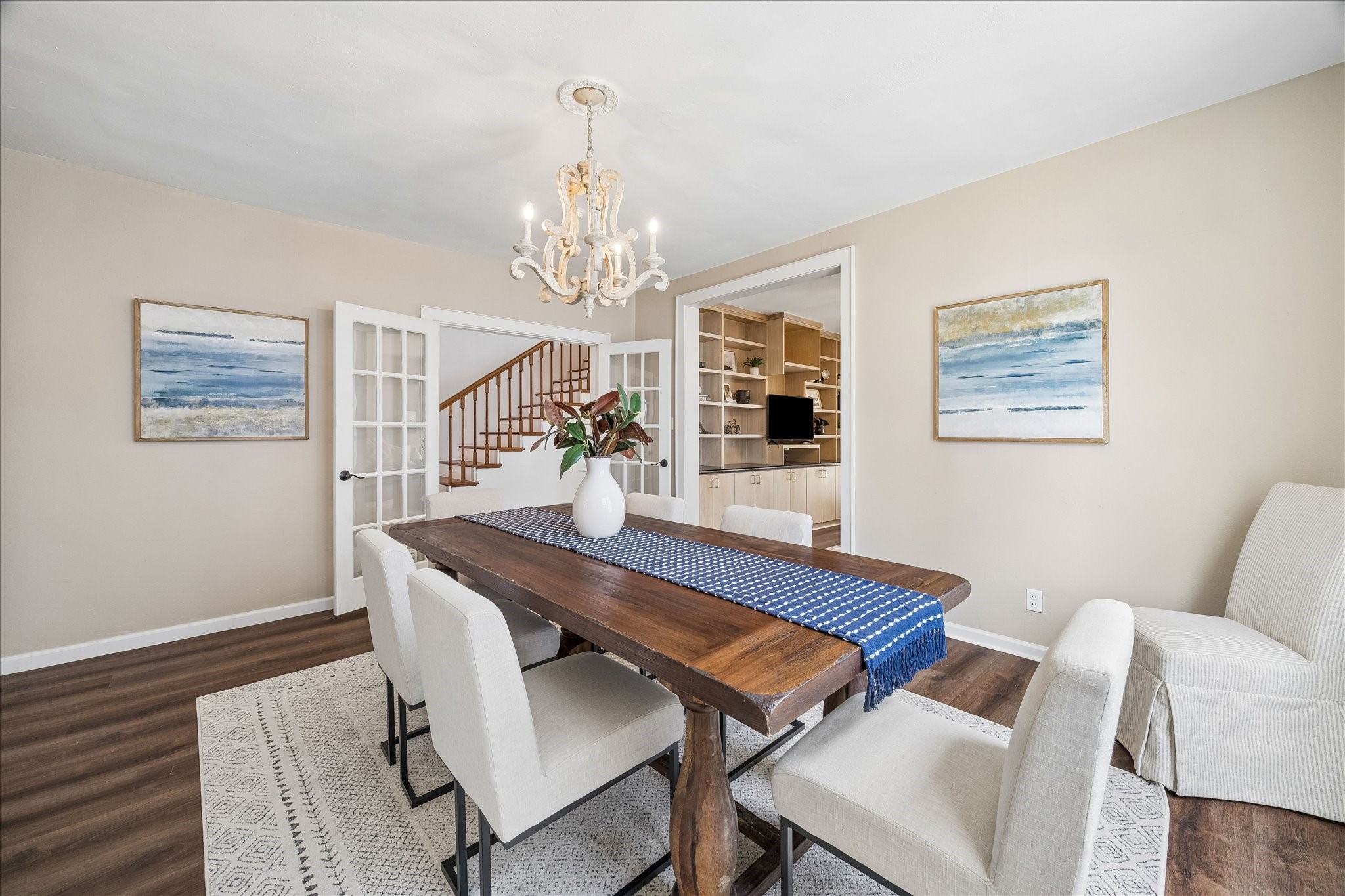 1812 Kane Street Houston, TX 77007 - Photo 10 of 41 a view of a dining room with furniture and chandelier