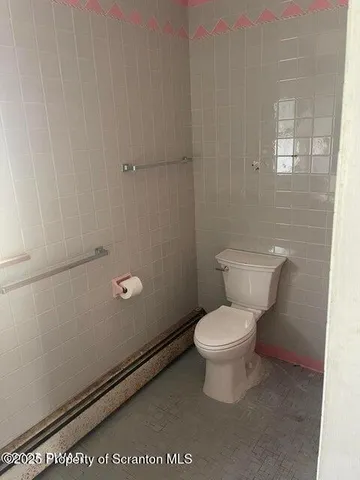 a living room with patio furniture