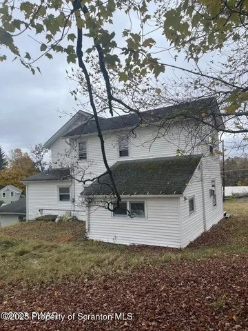 a house view with a outdoor space