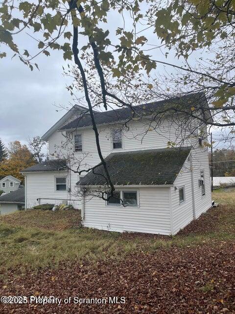 23 Village Road Beach Lake, PA 18405 - Photo 21 of 22 a view of a wooden house with a yard