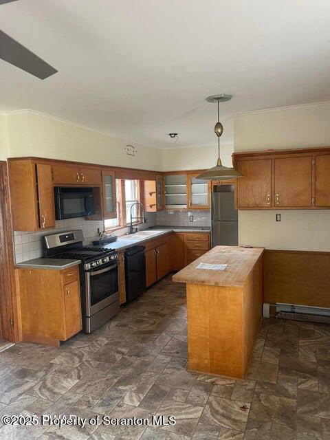 23 Village Road Beach Lake, PA 18405 - Photo 6 of 22 a kitchen with stainless steel appliances granite countertop a stove a sink and a refrigerator