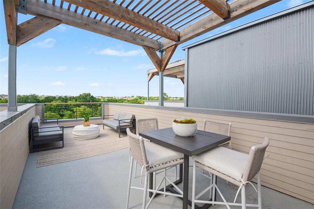 1111 Raiford Road, Unit 104 Carrollton, TX 75007 - Photo 2 of 30 a view of an outdoor seating area