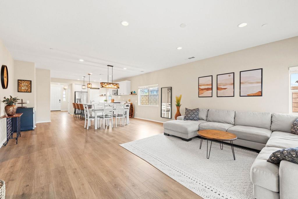 35846 Esperia Way Fallbrook, CA 92028 - Photo 19 of 60 a living room with furniture and wooden floor