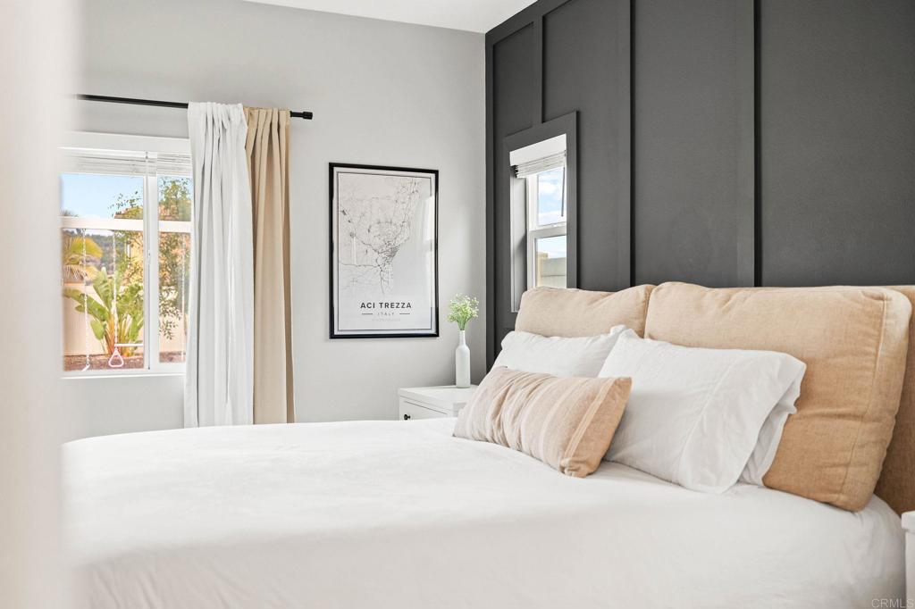 35846 Esperia Way Fallbrook, CA 92028 - Photo 26 of 60 a bedroom with a large bed and a window