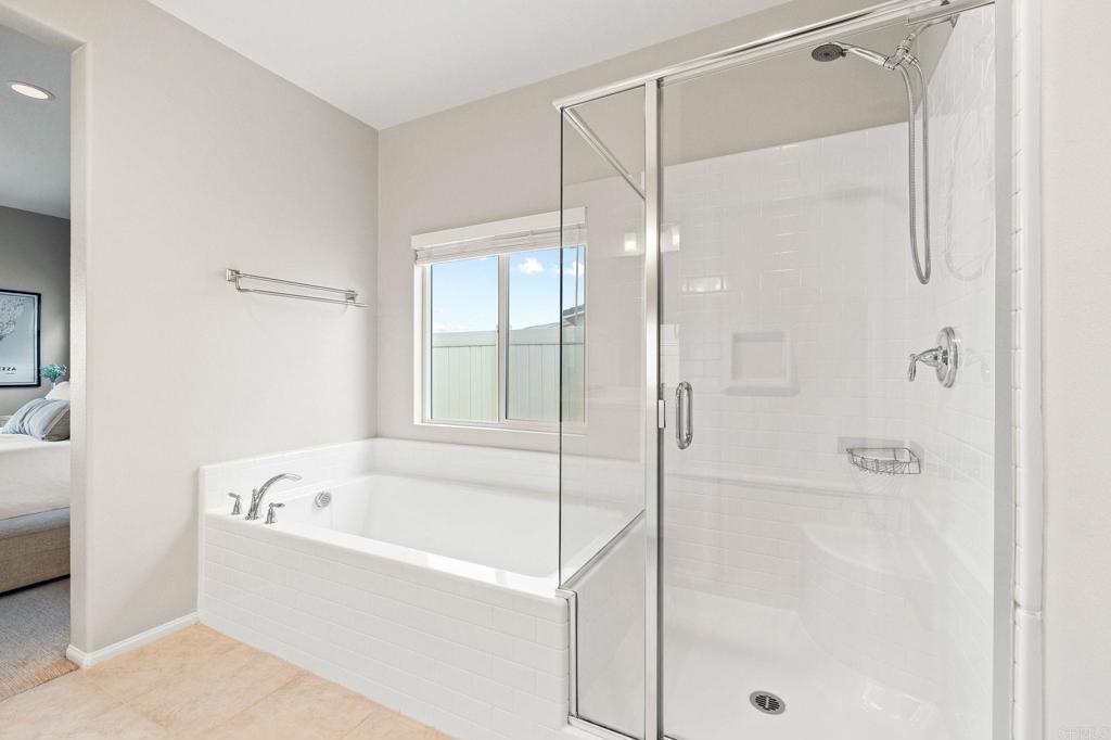 35846 Esperia Way Fallbrook, CA 92028 - Photo 28 of 60 a white bath tub sitting next to a shower