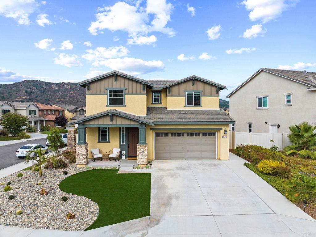 35846 Esperia Way Fallbrook, CA 92028 - Photo 4 of 60 a front view of a house with garden