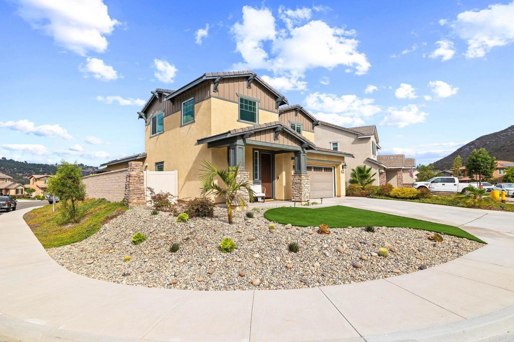 35846 Esperia Way Fallbrook, CA 92028 - Photo 5 of 60 a front view of a house with garden